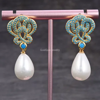 

GG Jewelry Teardrop White Sea Shell Pearl Gold Plated Turquoise Blue Cz Drop Earrings