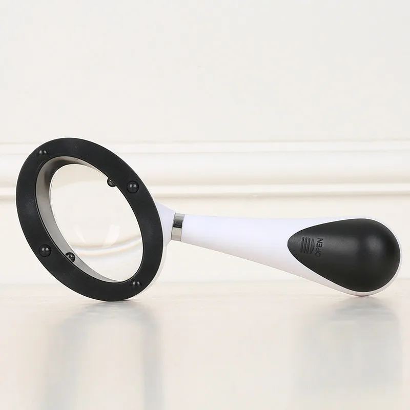 

High Quality Exquisite Oval Hand 60*35 LED Magnifier 6.5 Times Acrylic Magnifying Glass led magnifying lamp