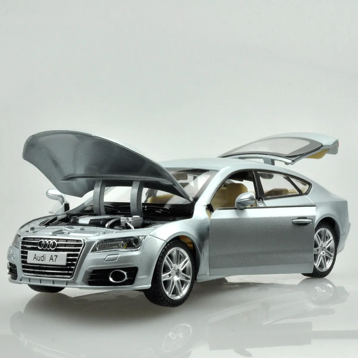1:24 Высокая Имитация Audi A7 автомобильный звук и светильник может открыть дверь детская развивающая игрушка модель автомобиля из сплава