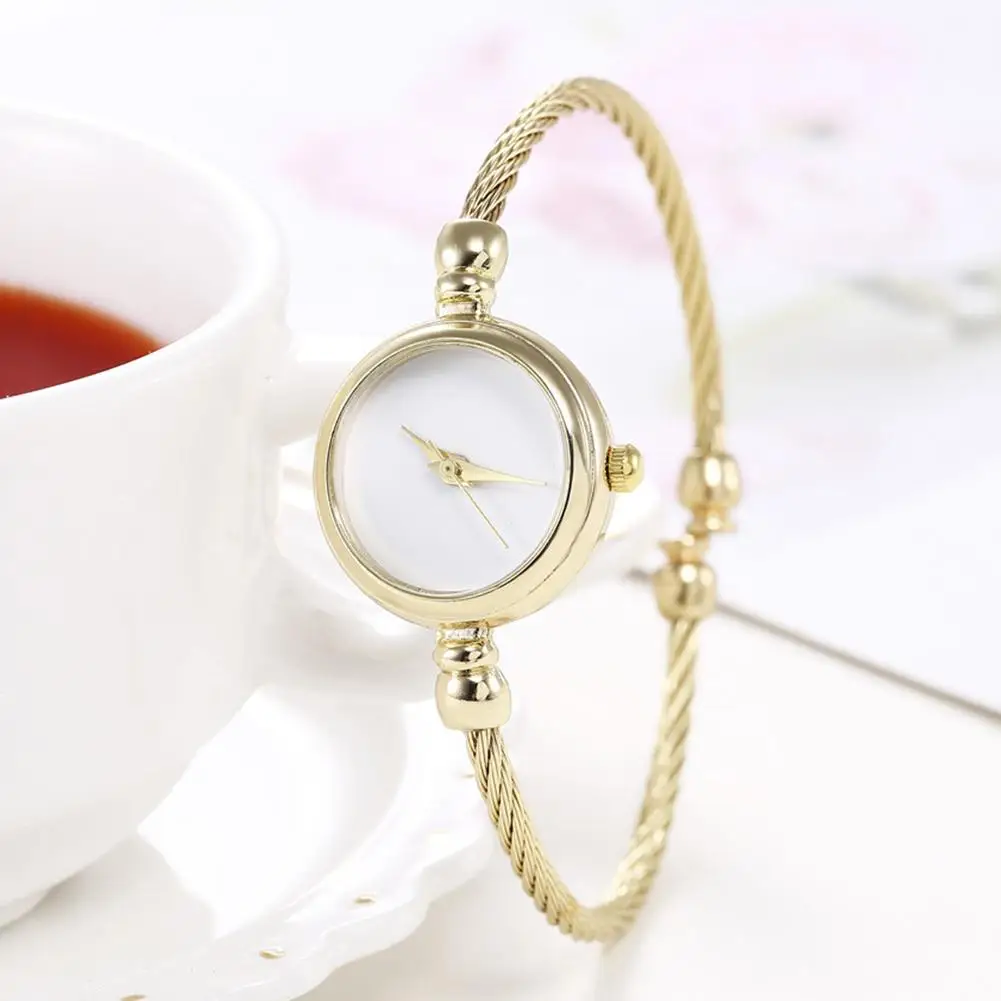 

Fashion Women No Scale Round Dial Alloy Wire Band Bangle Quartz Wrist Watch