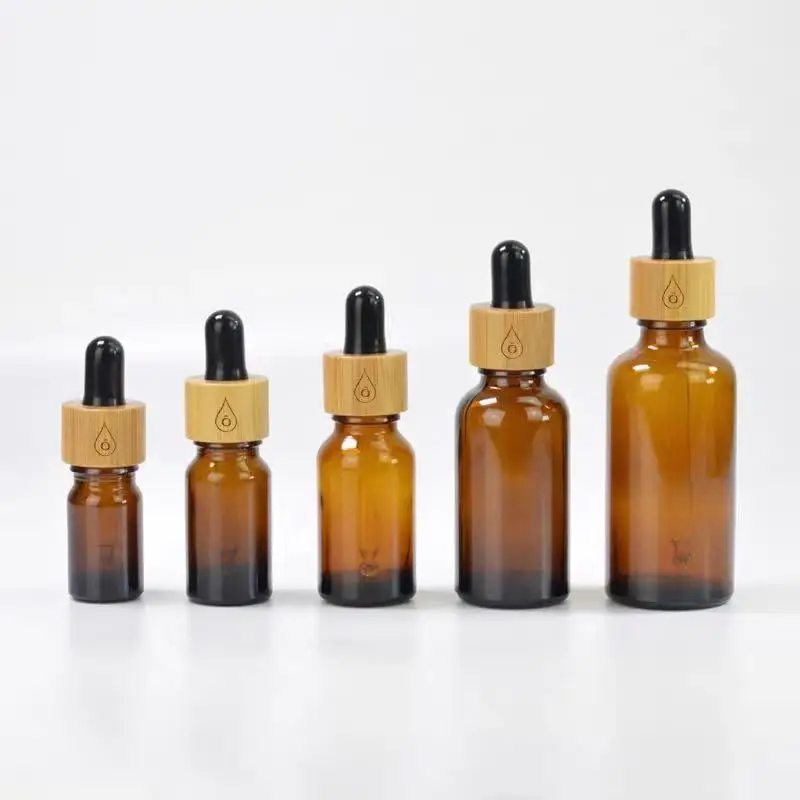 

30ML 50ml bamboo lotion pump caps Amber Glass Bottle with bamboo lids Cosmetic container Emulsion spray pump empty bottle 100ml