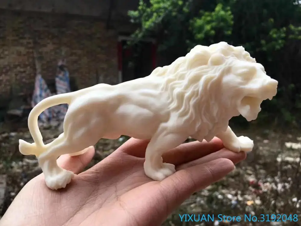 Ivory fruit carving lion lion lion money leopard car ornament car decoration tea font b pet