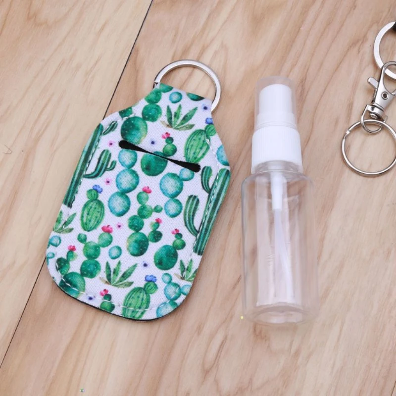 

Portable 1 oz Refillable Empty Travel Bottles with Keychain Holder Set Wristlet Keychain Bottle Container with Flip Caps