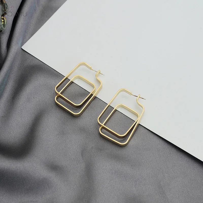 

AOMU Minimalist Gold Fashion Hollow Metal Gold Irregular Geometry Stud Earrings for Women Gifts Party Jewelry Pendientes