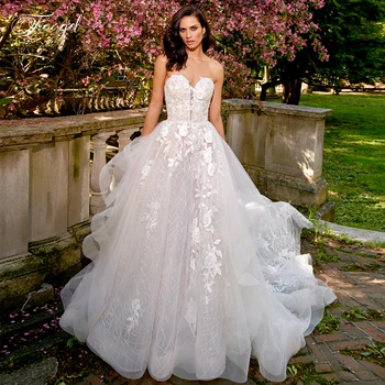 

Traugel Sweetheart A Line Lace Wedding Dresses Glitter Luxury Sleeveless Backless Bride Dress Court Train Bridal Gowns Plus Size