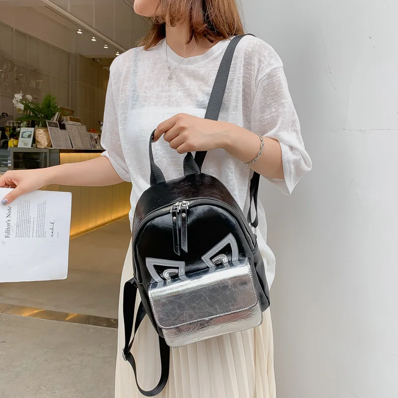 

2019 new laser bright backpack bag large eyes large capacity travel bag