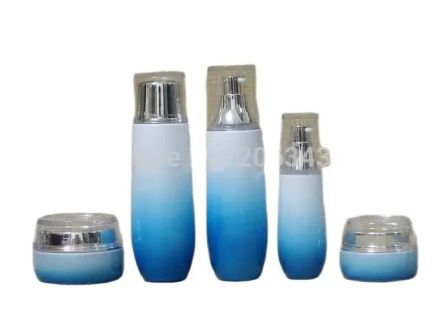 

100ml non-clear gradient blue glass bottle with silver pump for lotion or serum or foundation container using