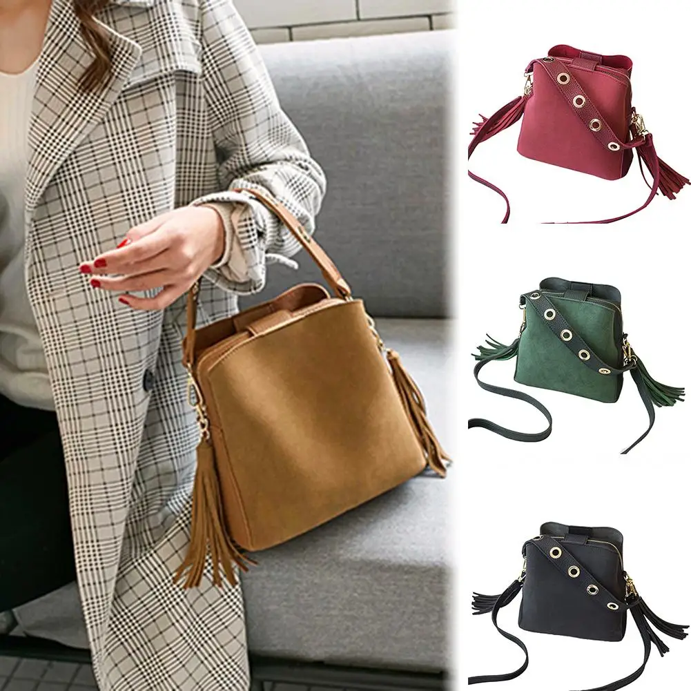 

Women Matte Solid Color Tassel Perforated Strap Shoulder Bucket Bag Handbag