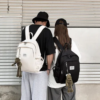 

Fashion Couple Backpack Nylon Cloth Waterproof Men And Women Simple Back Pack Casual Bag Pack With Small Frog Pendant