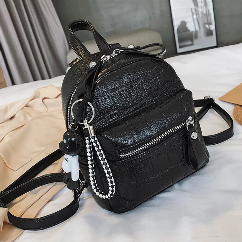 small black leather rucksack
