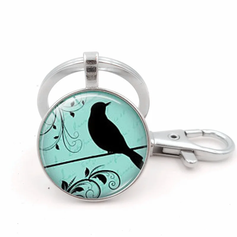 

New Products Bird Silhouette Magnets Time Stone Keychain Creative Metal Key Ring