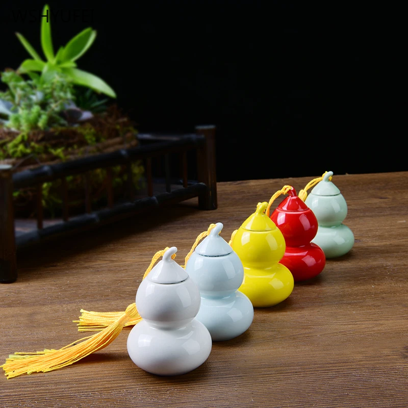 

4Pcs Gourd modeling tea cans small ceramic sealed storage tank portable small pot tea powder powder powder storage empty bottle