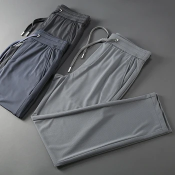 

JSBDHigh quality ultra-thin men's trousers, ice silk, hollow-mesh fabric, summer men's quick-drying sports casual trousers