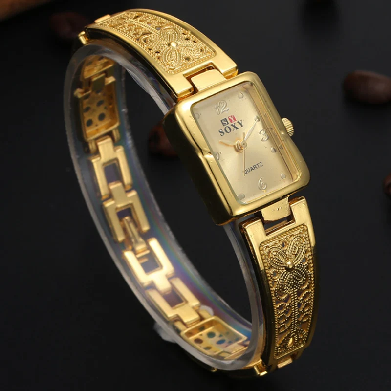 women s fashion flower hollow gold bracelet watch three pin digital square dial waterproof watch women s fashion quartz watch Women's Fashion Flower Hollow Gold Bracelet Watch Three Pin Digital Square Dial Waterproof Watch Women's Fashion Quartz Watch