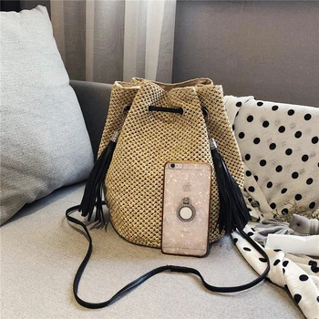 

Wild tassel straw bag small fresh bucket single shoulder diagonal bag female net red Korean new woven beach bag