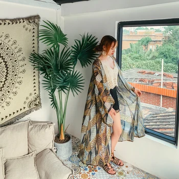 

Video scene shooting Bohemia resort long cardigan seaside beach chiffon loose restoring ancient ways is prevented bask in coat