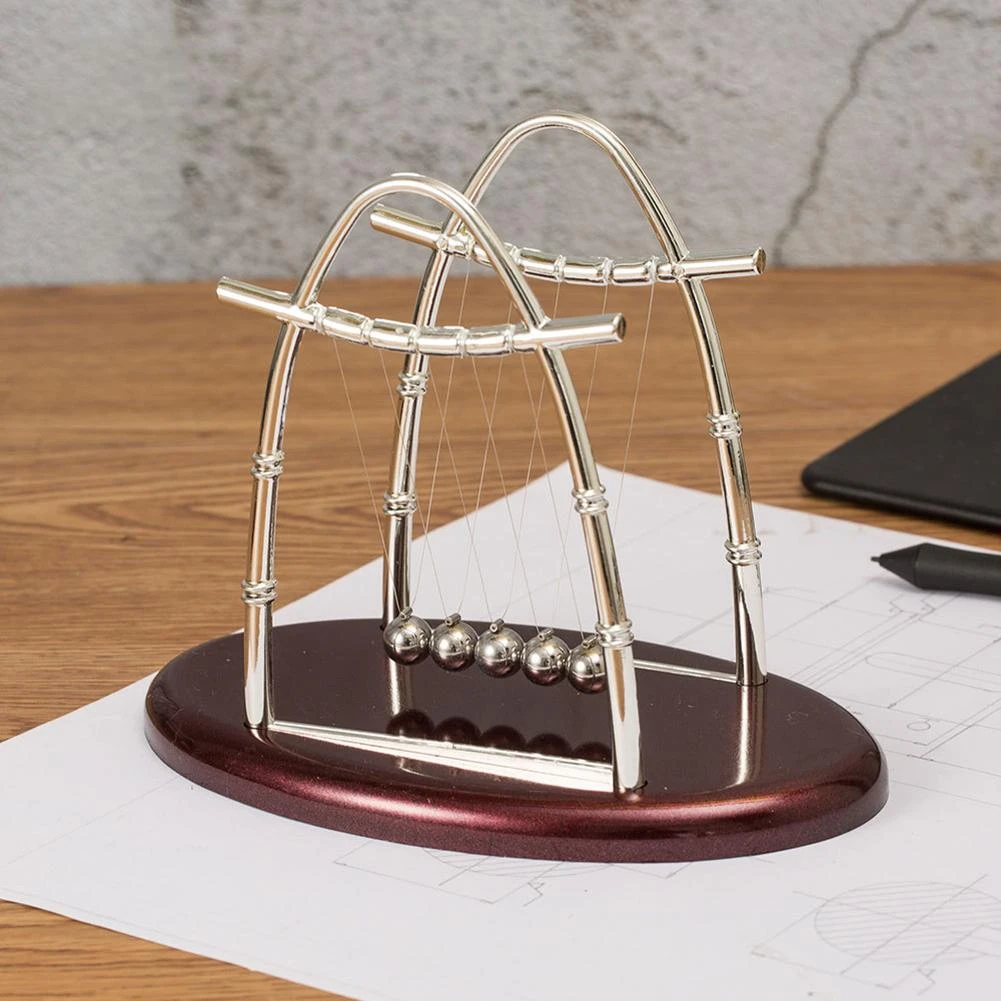 cradle desk toy