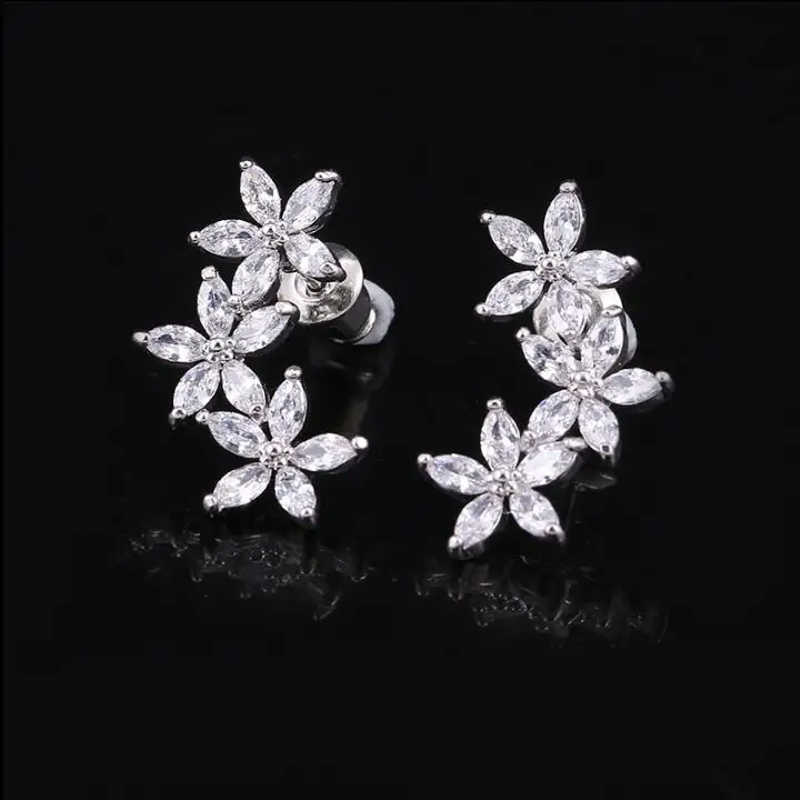 

Korean Fashion Flower Shaped Cubic Zirconia White Stud Earrings for Woman Girls Dress Accessories Jewelry Wholesale KE34