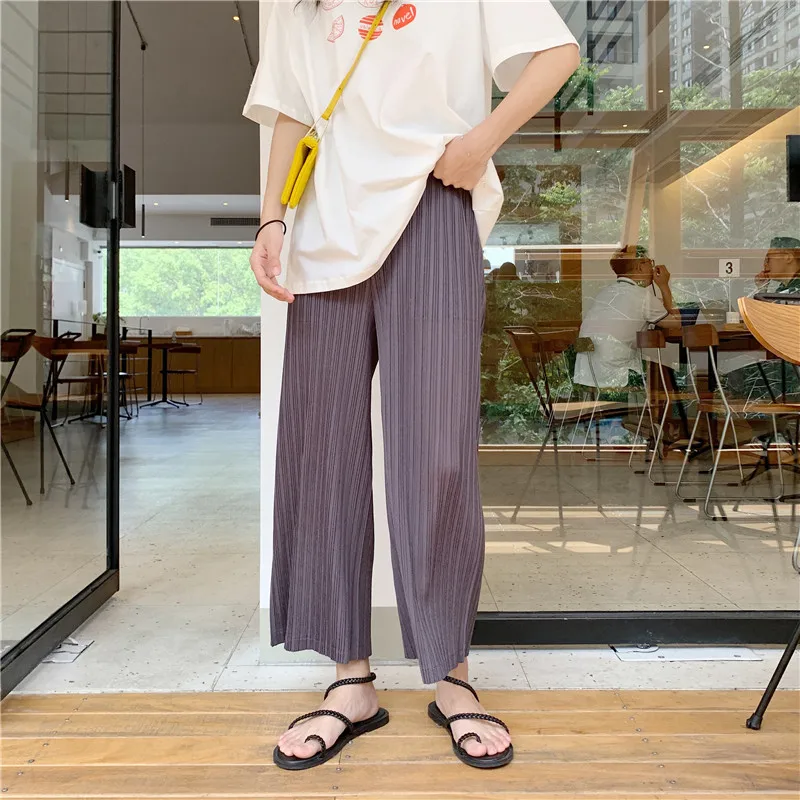 Miyake's loose slim wrinkled wide-legged pants and nine-minute pants free shipping