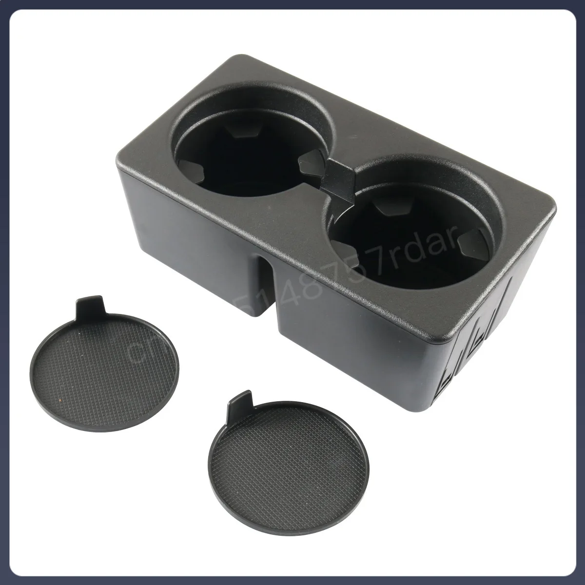 Thecenterconsolecupholderisinsertedintothetraywatercup