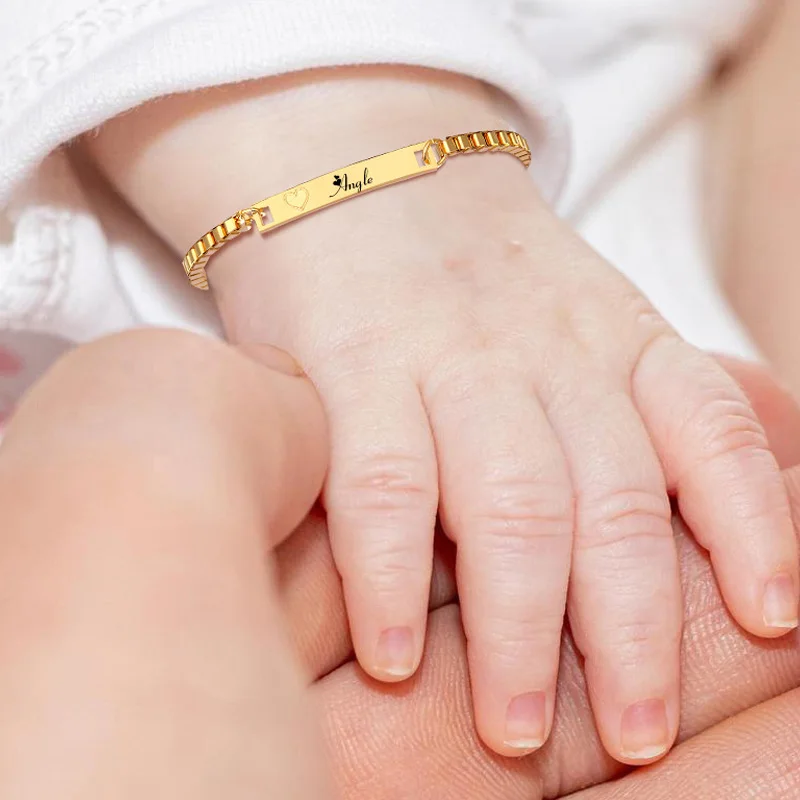 22ct gold baby bracelet features hand-carved gold & black beads