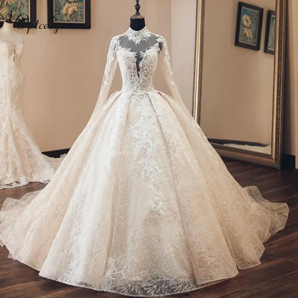 

Optcely New Glamorous High Neck Long Sleeves See-through Wedding Dresses 2019 Vintage Appliques Beaded Court Train Bridal Gowns