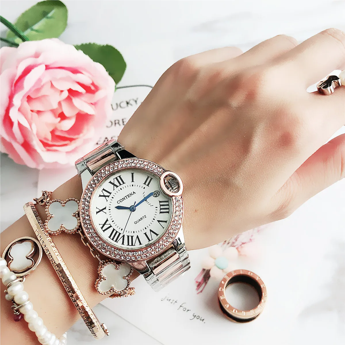 

6670Y The brand is designed for fashion trends with diamond-encased steel belt quartz ladies' watches