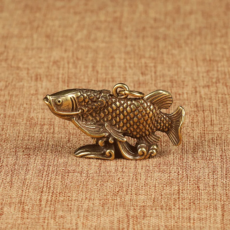 brass fish pendants (4)