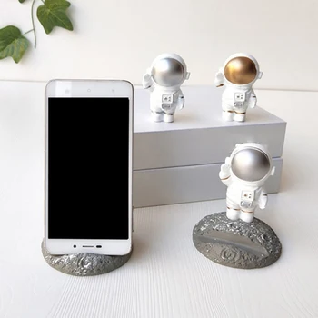 

1pcs Astronaut Mobile Phone Holder Cute Desktop Mobile Phone Stand Cartoon Resin Material Model Desktop Ornament Phone Stand