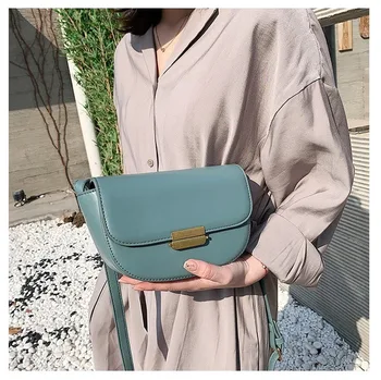 

2020 new small fresh girl saddle bag fashion pu leather ladies one-shoulder wild cross-body small round bag