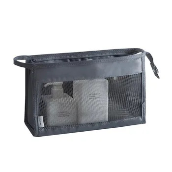 

2020 new wash bag small female hand proposes poor portable cosmetic storage bag makeup case