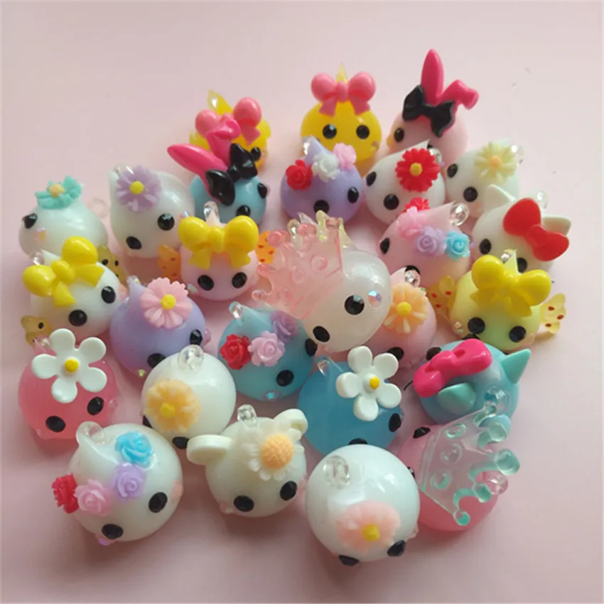 

DIY kawaii charms ship by random 20pcs mix (it is soft) 16mm(size only for silicone,do not iclude resins on it)