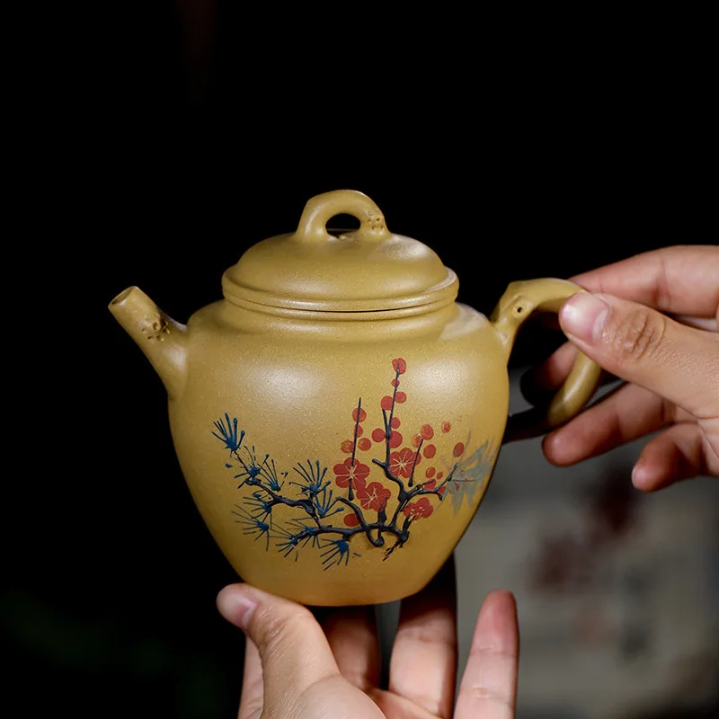 

Yixing Dark-red Enameled Pottery Teapot Raw Ore Section Mud Pure Full Manual Floral Pine Plum Pile Pot Competitive Products