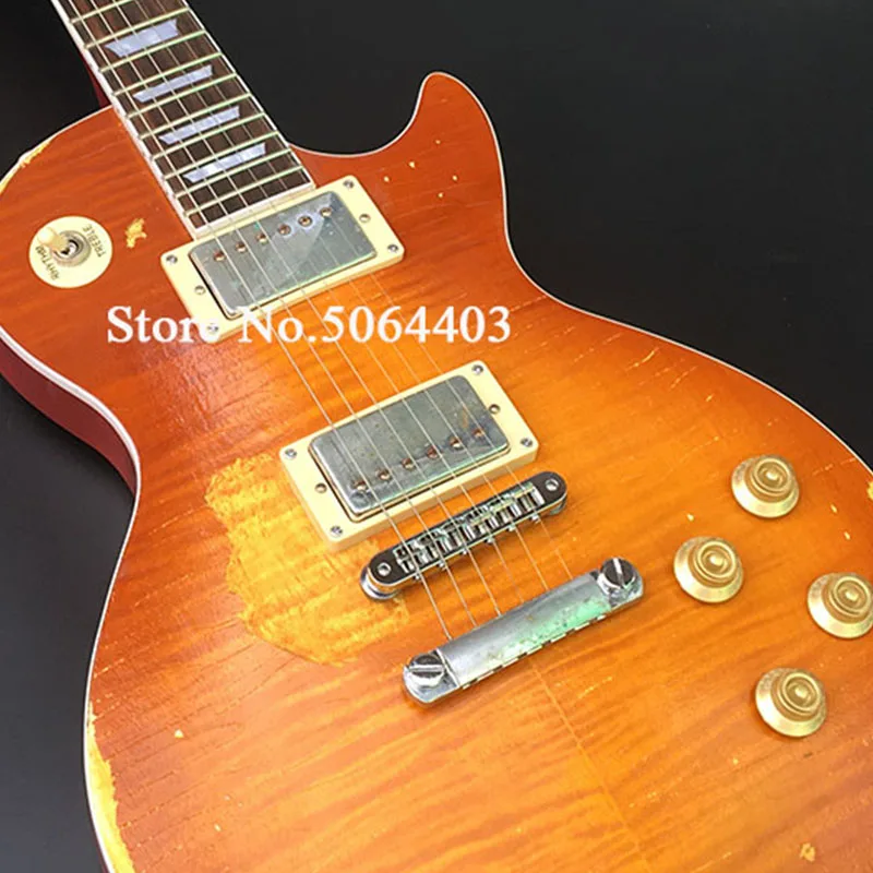 

Hand carved relic electric guitar hand aged metal nitrocellulose paint dyed red,one piece mahogany neck and body