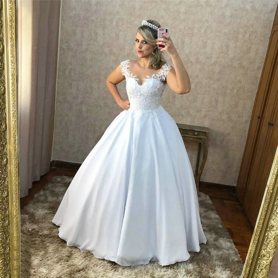 Elegante V-hals Lace Witte Trouwjurk 2020 Baljurk Mouwloze Bruidsjurken Elegante V-hals Lace Witte Trouwjurk 2020 Baljurk Mouwloze Bruidsjurken