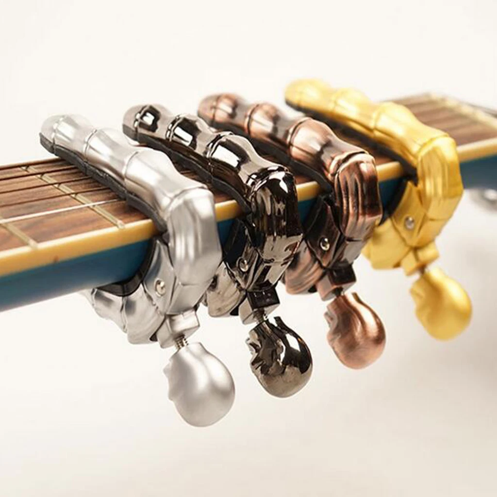

Guitar Ukulele Capo Skull Knob Design Key Clamp with Rubber Pads Stringed Instruments
