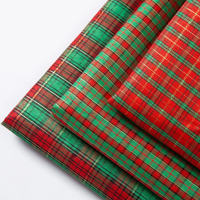 

100% Polyester Christmas plaid fabric hot-stamping cloth Custom snowflake printing patchwork DIY Christmas Gift packaging