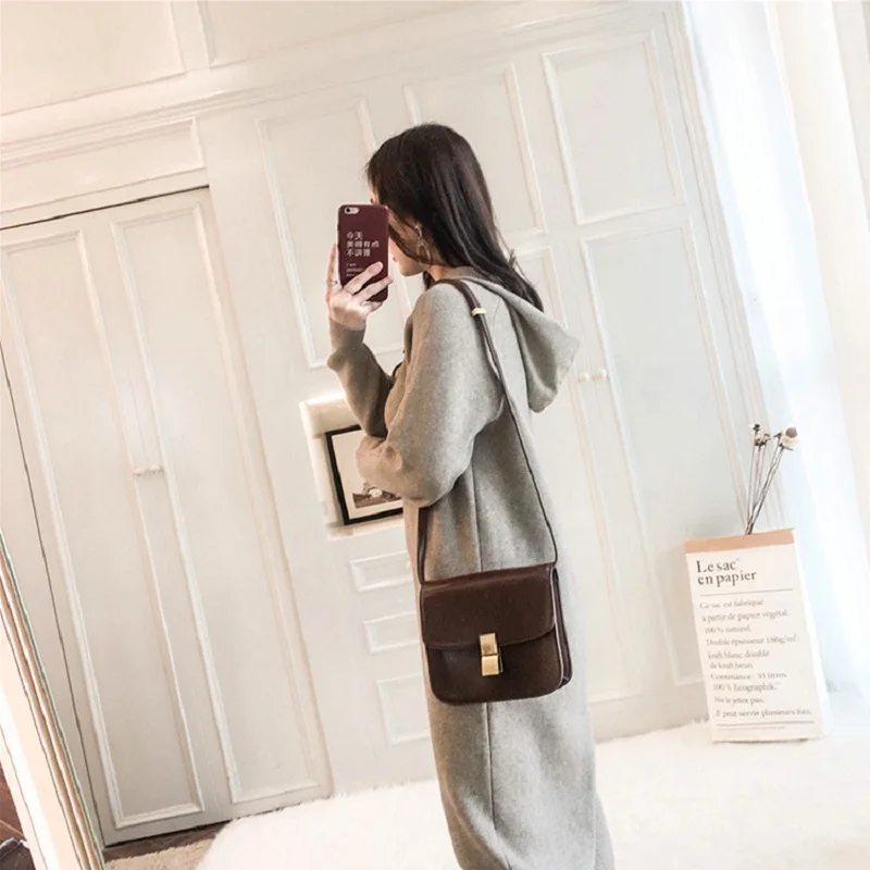 Women's autumn and winter knitted dress, long section, long sleeve hooded sweater, lazy wind, loose sweater dress, solid color