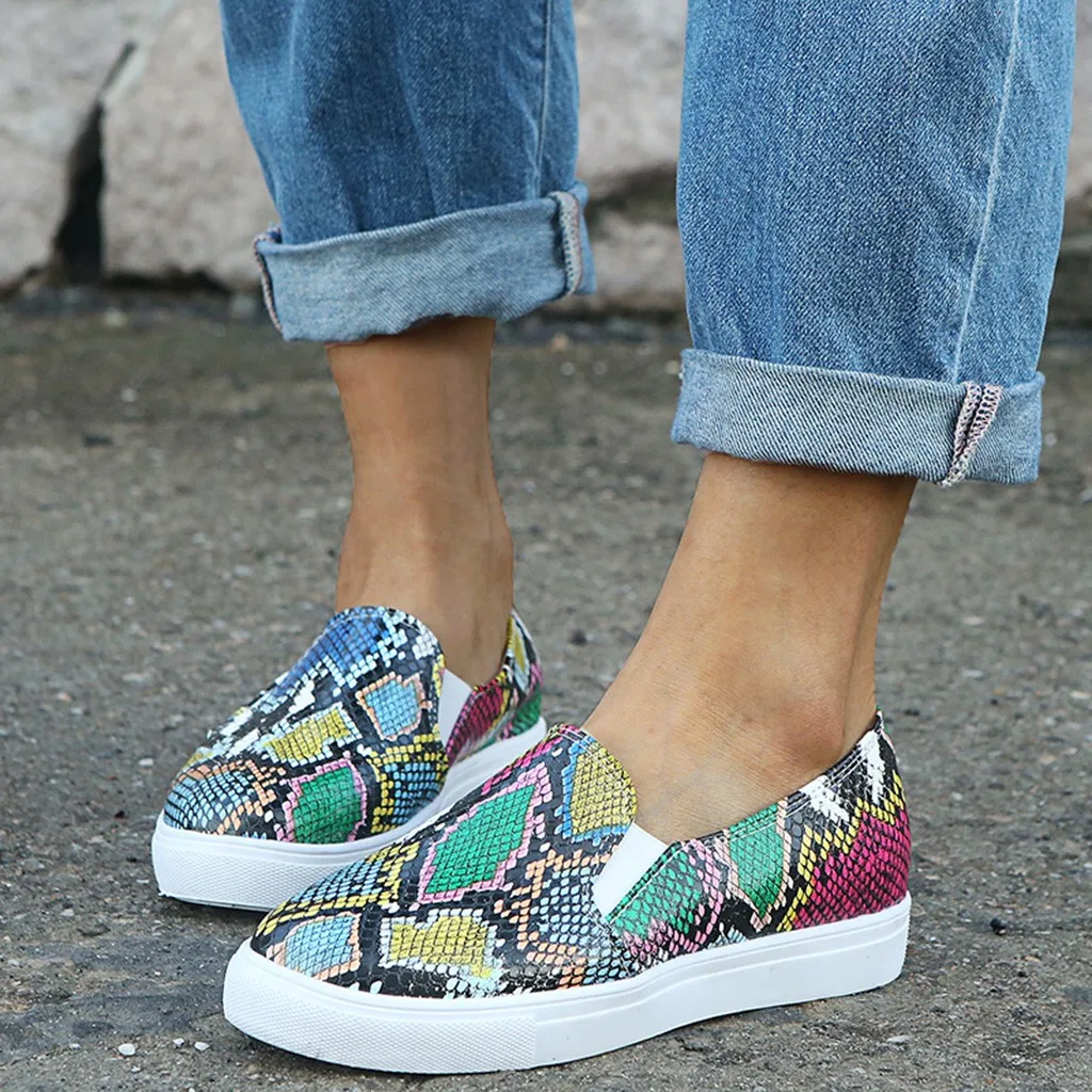 snake print slip on sneakers