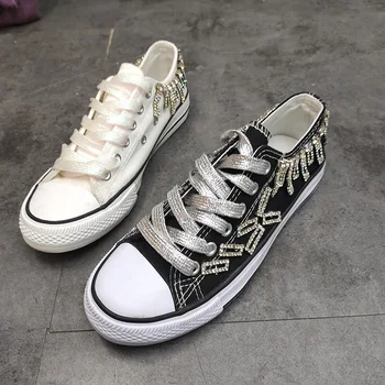 

Korean canvas shoes white shoes heavy hand-made rhinestone flowers tassel flat shoes women's shoes tide white shoes