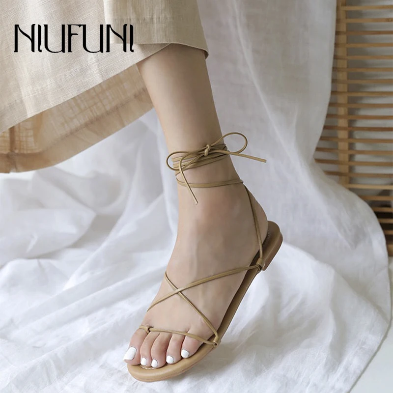 

Ankle Strap Flat Shoes NIUFUNI Gladiator Solid Color Women Sandals Casual Lace Up Flats Beach Shoes For Women Chaussures plates