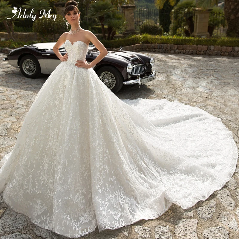 

Adoly Mey Glamorous Appliques Royal Train Lace Ball Gown Wedding Dress 2020 V-Neck Beaded Off the Shoulder Princess Bridal Dress