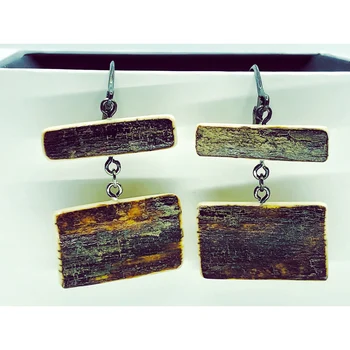 

Stylish earrings Peel бивня Mammoth