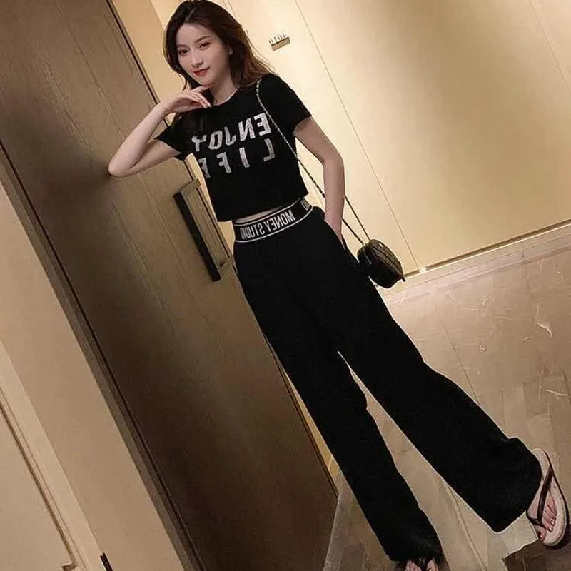 Casual 2 Piece Set Women T-Shirt Top + Harlan Pants Summer Black Trend Tracksuit Women Student Two Piece Outfits Female elastic waist jeans female korean style high waist harlan nine point daddy feet pants mom jeans