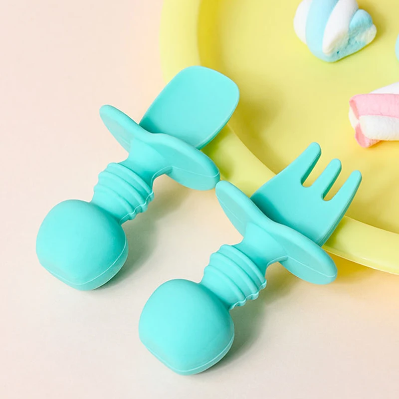 

2Pcs/Set Baby Spoon Fork Set Food Grade Silicone Short Knob Elastic Safe Spoon Head Infant Feeding Tableware Baby Training Spoon