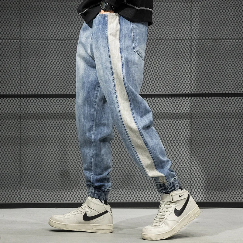 Reviews 2020 New Korea Style Famous High Street Fashion Men Jeans Blue Color Ripped Jeans Jeans Men Motor Biker Jeans Homme