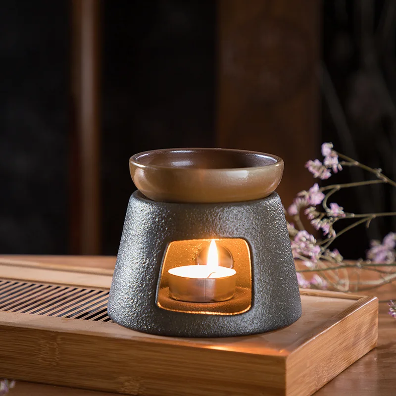 https://ae01.alicdn.com/kf/H1a56e87c076b406dab78e2f596de9cd4i/Candle-Heating-Base-Pottery-Tea-Stov-Japanese-Ceramic-Heater-Stand-Tea-Maker-Teapot-Warmer-Insulation-Base.jpg