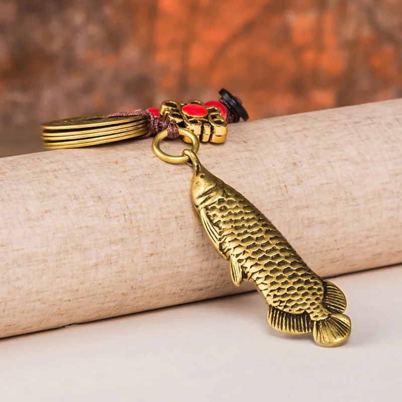 brass fish pendants (6)