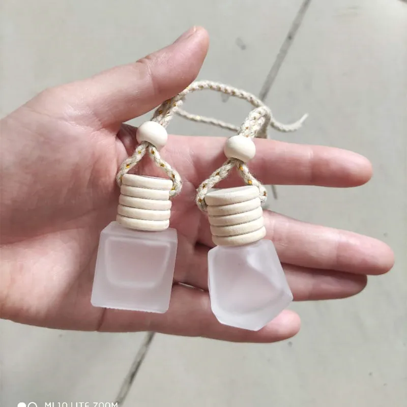 

Wholesale 6ML Air Freshener Car-styling Perfume Pendant For Essential Oils Car Perfume Bottles Frosted Glass Mini Auto Ornament
