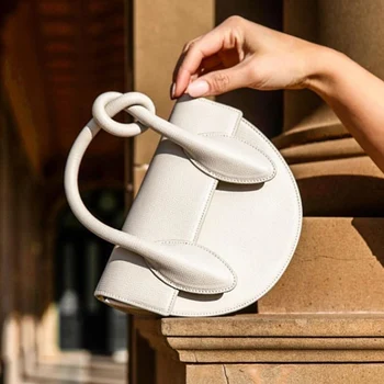 

Bag female 2020 new European and American niche designer semi-circular small bag knotted shoulder diagonal bag